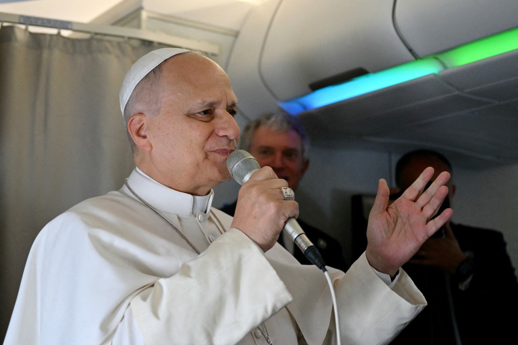 Pope Leo XIV addresses journalists during the flight heading to Algiers on April 13, 2026. (Reuters)