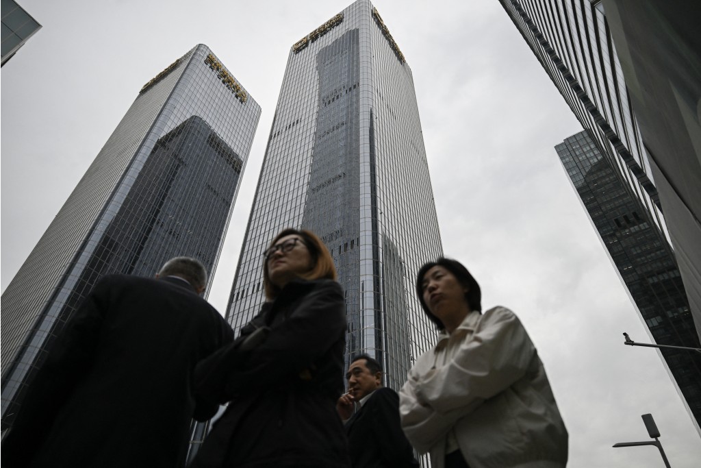The building (C) where the Zhong Lun Law Firm is located, where new White House Press Secretary Katie Zacharia previously worked as a lawyer, is pictured in Beijing on October 16, 2026. (Photo by Pedro PARDO / AFP)