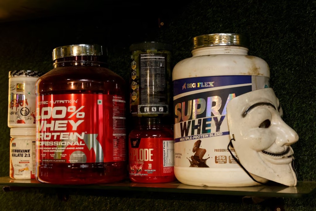 Boxes of whey protein are displayed on a shelf in a gym in New Delhi, India, January 15, 2025. REUTERS/Priyanshu Singh/File Photo