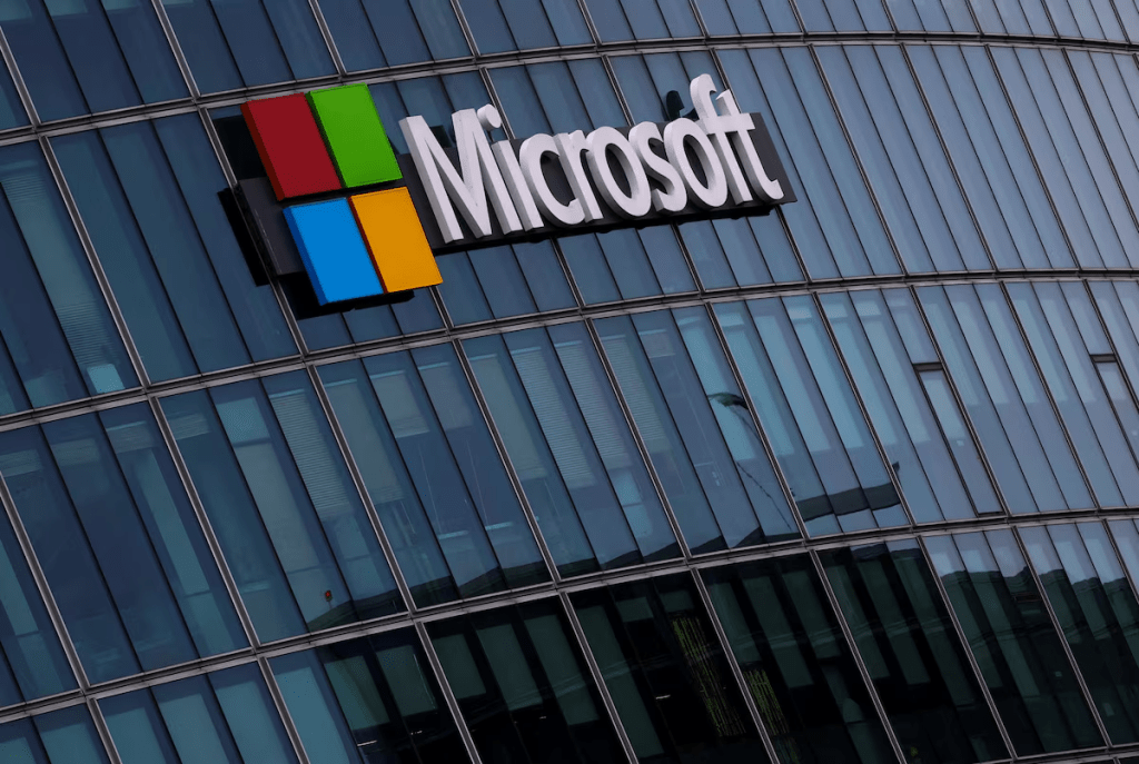 A view shows a Microsoft logo at Microsoft offices in Issy-les-Moulineaux near Paris, France, March 21, 2025. REUTERS/Gonzalo Fuentes/File Photo
