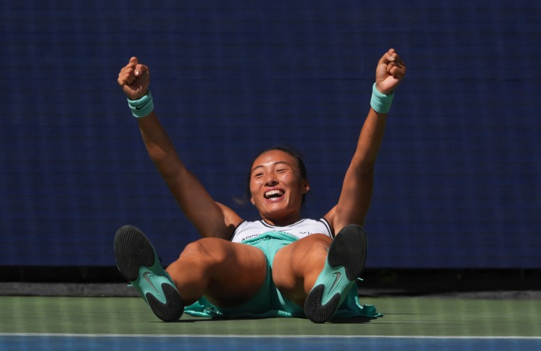 Zheng Qinwen celebrates her comeback win over Iga Swiatek in the round of 16.  REUTERS