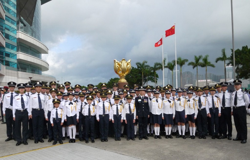 Hui leads the flag-raising team in conducting the flag-raising ceremony at the Golden Bauhinia Square. (Photo provided by Hui)
