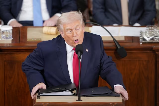 U.S. President Donald Trump delivers the State of the Union address in the House Chamber of the U.S. Capitol in Washington, D.C., U.S., February 24, 2026. REUTERS/NATHAN HOWARD