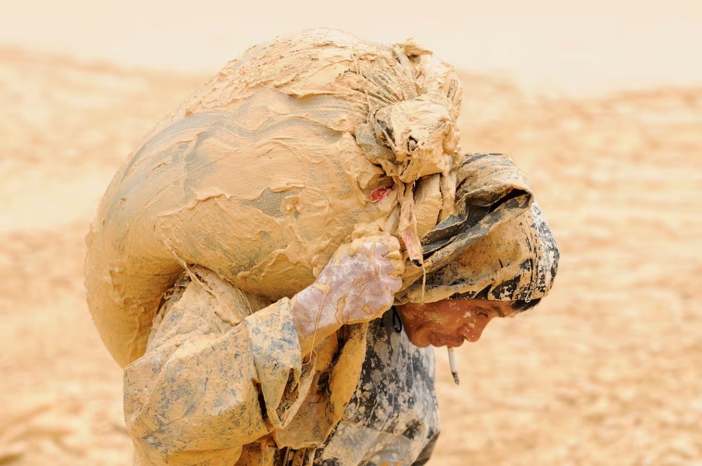 A man works at the site of a rare earth metals mine at Nancheng county, Jiangxi province. (Reuters)