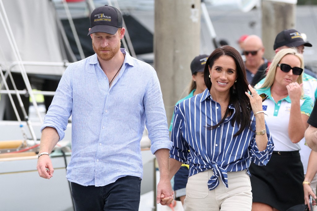 Britain's Prince Harry and Meghan, the Duke and Duchess of Sussex, arrive at Rushcutters Bay following a sail on Sydney Harbour with veterans from the Invictus Australia community, in Sydney, Australia, April 17, 2026. (Reuters)