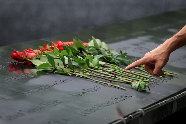 Flowers amongst the names on the North Pool at the 9/11 Memorial & Museum ahead of the 25th anniversary of the September 11, 2001 attacks on the World Trade Center in New York, U.S., August 31, 2026. REUTERS/Brendan McDermid