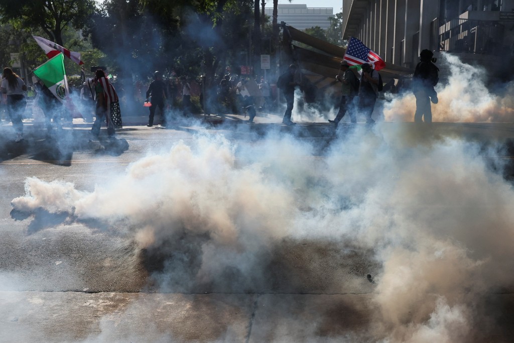 Waves of protesters flood US streets against 'king' Trump