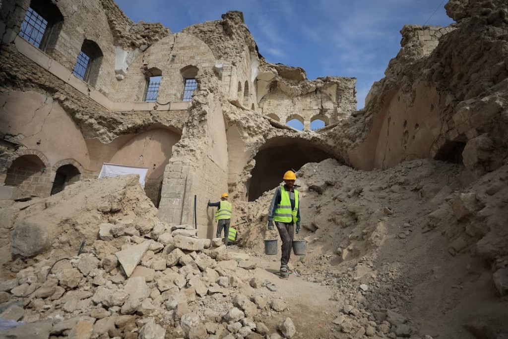  Workers carry out restoration work at the historical Al-Basha Palace, damaged during the war, in Gaza City, November 13, 2025. REUTERS/Dawoud Abu Alkas