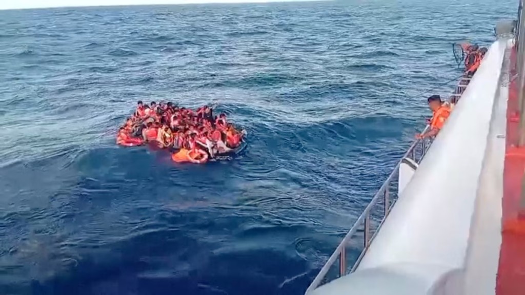 Passengers rescued from the KM Putri Yasmin ferry that caught fire in waters off Lombok, float in the sea during a rescue operation, in Indonesia, August 12, 2026, in this screengrab taken from a handout video. Basarnas/Handout via REUTERS