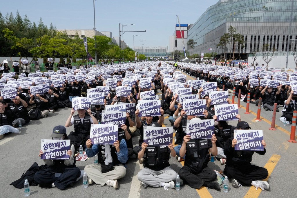 Samsung workers gathered at the company' s Pyeongtaek, South Korea, Thursday, April 23, 2026.  AP Photo/Ahn Young-joon