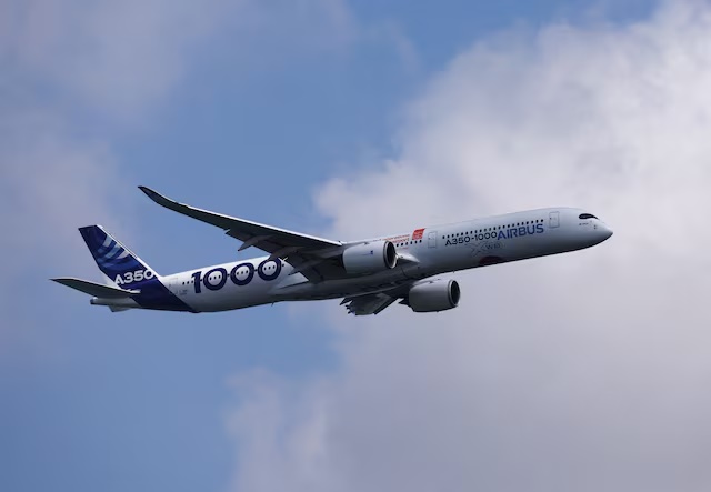 An Airbus A350-1000 flies during an aerial flying display ahead of the Singapore Airshow at Changi Exhibition Centre in Singapore, February 18, 2024. REUTERS/Edgar Su/File Photo