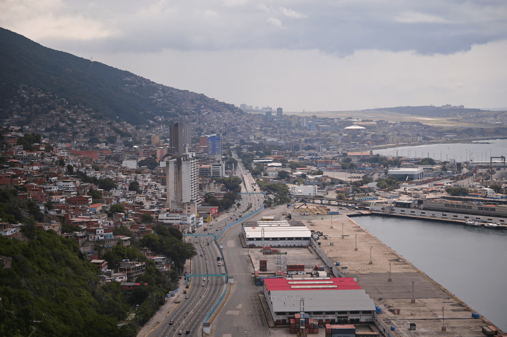 Buildings stand near the Bolivariana de Puertos La Guaira port as the Venezuelan government activates militia units amid tensions with U.S. over warships deployed in the Caribbean, in La Guaira, Venezuela, September 5, 2025. REUTERS/Gaby Oraa