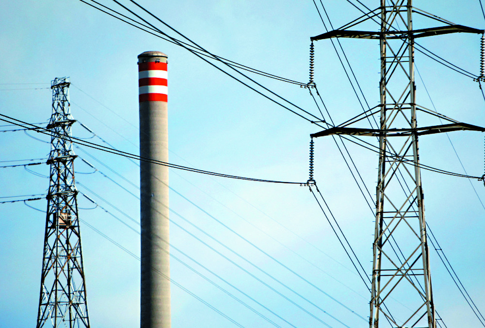 High tension electricity towers are seen close to a power station on the outskirts of Melbourne. Reuters High tension electricity towers are seen close to a power station on the outskirts of Melbourne. Reuters