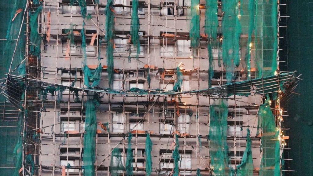 Early reports suggested contractors' use of flammable foam and other illegal materials. sing tao