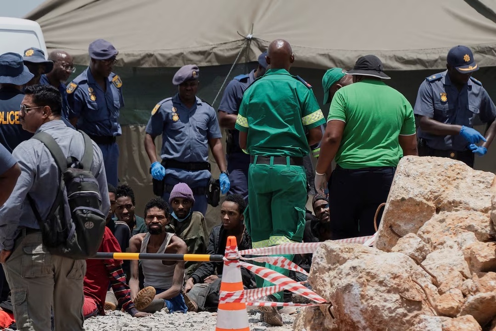 Rescued miners are seen as they are processed by police after being rescued at the mine shaft where rescue operations are ongoing as attempts are made to rescue illegal miners who have been underground for months, in Stilfontein, South Africa, January 14, 2025. REUTERS/Ihsaan Haffejee/File Photo Rescued miners are seen as they are processed by police after being rescued at the mine shaft where rescue operations are ongoing as attempts are made to rescue illegal miners who have been underground for months, in Stilfontein, South Africa, January 14, 2025. REUTERS/Ihsaan Haffejee/File Photo