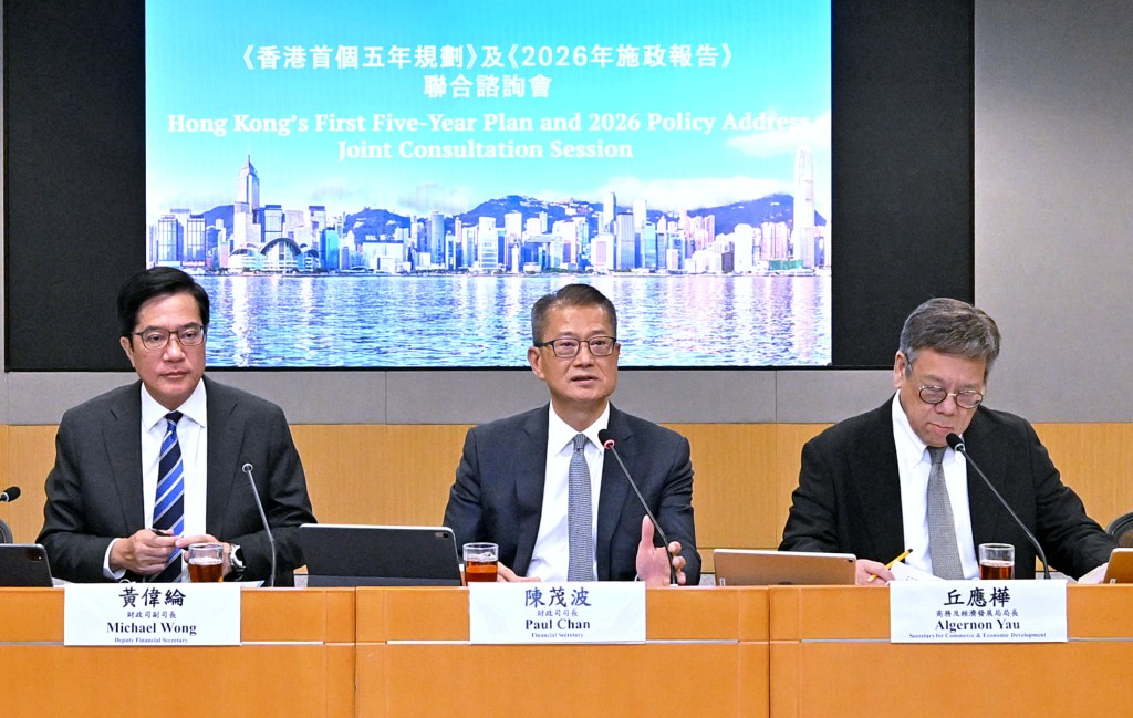 From left, Deputy Financial Secretary Michael Wong Wai-lun, Paul Chan and Secretary for Commerce and Economic Development Algernon Yau Ying-wah.