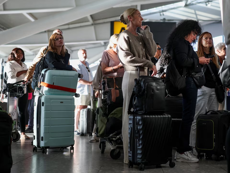 Passengers wait for news on their flights at Heathrow Airport's Terminal 5 in London, Britain, September 8, 2026. Some departing flights at major British airports were disrupted on Tuesday after air traffic control provider NATS experienced a technical issue, with Heathrow, Gatwick, Manchester and Stansted among the airports affected by restrictions and delays. REUTERS/Isabel Infantes