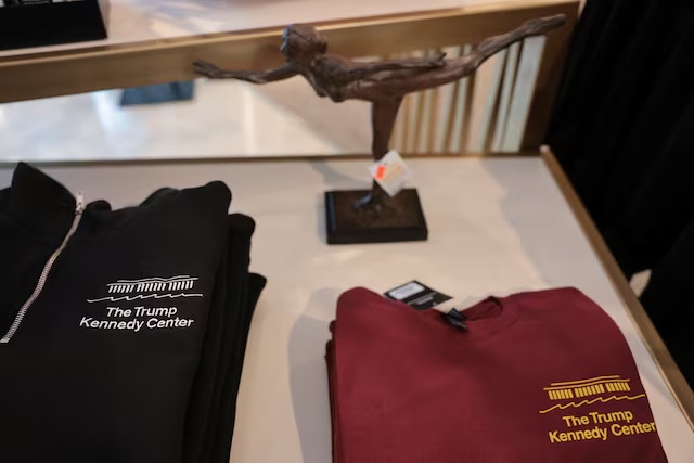 Merchandise with the Trump name remains for sale in the Kennedy Center gift shop in the hours before a federal judge’s deadline to remove U.S. President Donald Trump's name from the facade of the John F. Kennedy Memorial Center for the Performing Arts in Washington, D.C., U.S., June 11, 2026. REUTERS/Jonathan Ernst