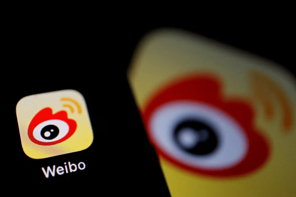 The logo of Chinese social media app Weibo is seen on a mobile phone in this illustration picture taken December 7, 2021. REUTERS/Florence Lo/Illustration 