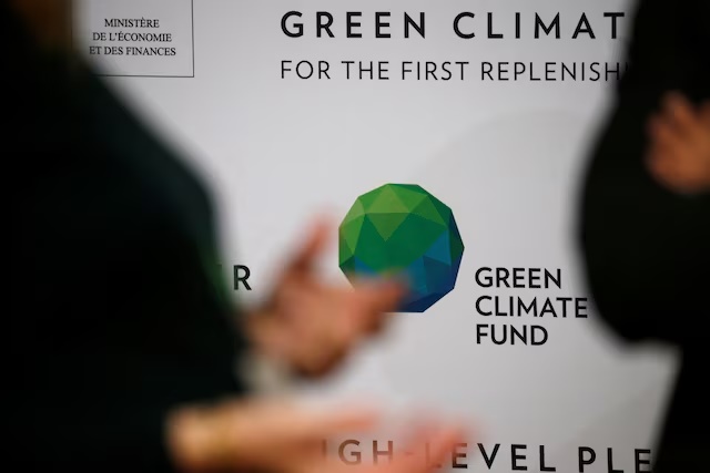 People arrive to attend the Pledging Conference of the Green Climate Fund (GCF) for the First Replenishment in Paris, France, October 25, 2019. REUTERS/Pascal Rossignol 