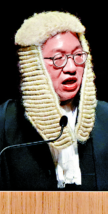 Speaking at the ceremonial opening of the legal year are, from left, Paul Lam, Victor Dawes and Roden Tong. SING TAO