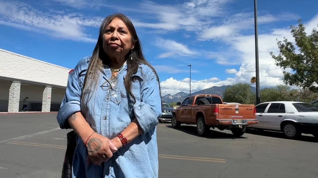 Ethel Yazza, 67, a member of New Mexico's Santa Clara and Picuris indigenous communities, stands outside a store in this screen grab taken from a video, in Taos, New Mexico, U.S., September 8, 2026. Yazza said she opposes U.S. President Donald Trump's idea of renaming New Mexico "New America". REUTERS/Andrew Hay 