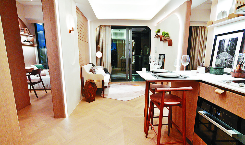 LESS IS MORE: The living and dining area’s appeal is enhanced through the clever use of lighting.