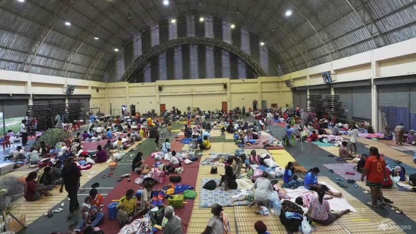 Thai residents who fled homes following clashes between Thai and Cambodian soldiers rest at an evacuation centre in Surin province, Thailand on Jul 25, 2025. (Photo: AP/Sakchai Lalit)