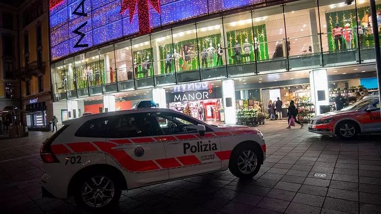 A police car in the area where a stabbing occurred in Lugano. (AFP) A police car in the area where a stabbing occurred in Lugano. (AFP)