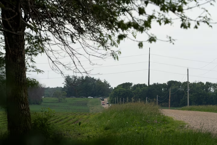 A tow truck arrives on the scene to remove a vehicle associated with 57-year-old Vance Luther Boelter, the suspect in the shooting deaths of senior Democratic state assemblywoman Melissa Hortman and her husband Mark, in Belle Plaine, Minnesota, U.S., June 15, 2025. (Reuters)