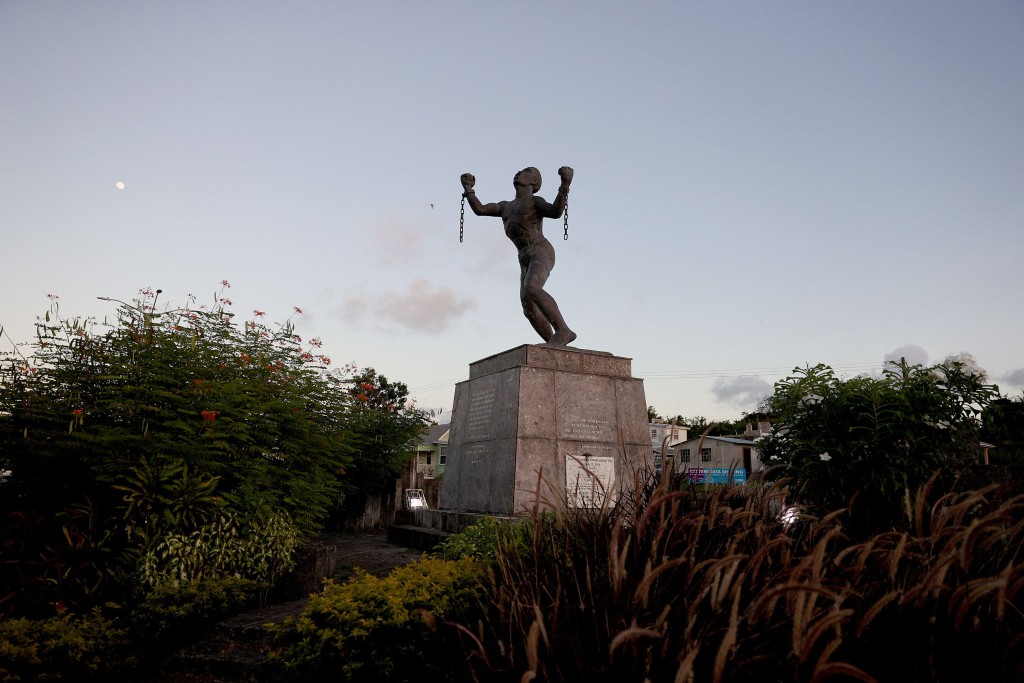The Emancipation Statue symbolising the breaking of the chains of slavery in Bridgetown, Barbados (AFP)