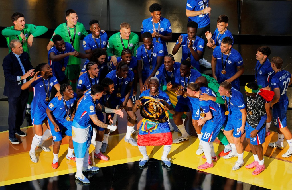 Chelsea's Moises Caicedo and teammates celebrate with the trophy after winning the FIFA Club World Cup. (Reuters)