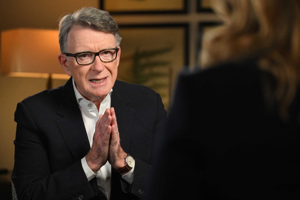 Photo by JEFF OVERS / BBC / AFP  A handout picture released by the BBC on January 11, 2026, taken on January 10, 2026, and broadcast on the BBC's 'Sunday' political television program, shows Peter Mandelson, Britain's former Ambassador to the US being interviewed by journalist Laura Kuenssberg in London.