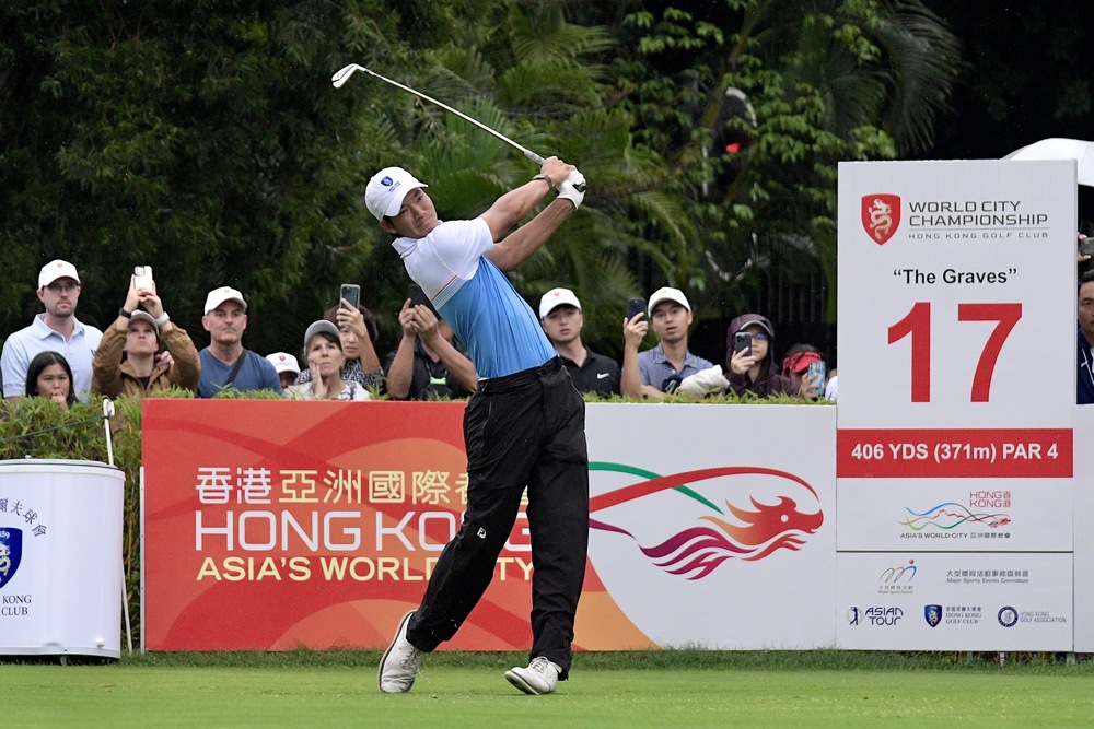 Taichi Ko beat a field that included Ian Poulter, who he met in 2010 following the Englishman's win at the Hong Kong Open, below.   