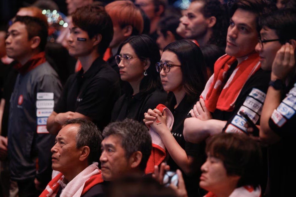  Employees of 'ispace' react as they wait for the signal from the touchdown of its lunar lander Resilience on the Moon at a venue to watch its landing in Tokyo, Japan, June 6, 2025. REUTERS/Manami Yamada