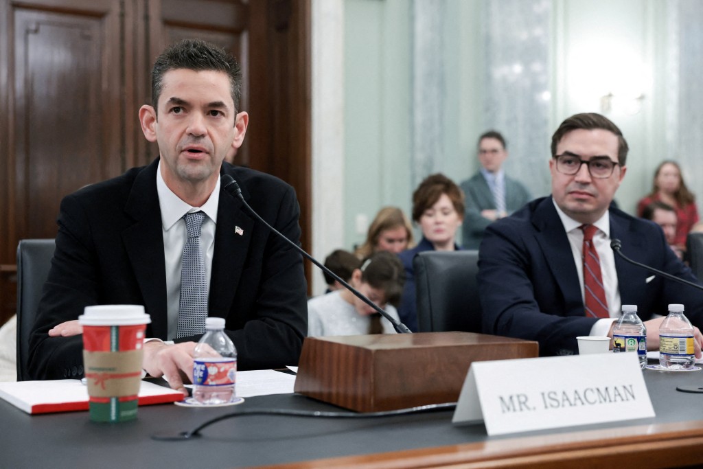  Jared Isaacman, U.S. President Donald Trump's nominee to be administrator of the National Aeronautics and Space Administration (NASA), and Steven Haines, nominated to be Assistant Secretary of Commerce for Industry and Analysis, testify during a Senate Commerce, Science, and Transportation confirmation hearing on Capitol Hill in Washington, D.C., U.S., December 3, 2025. REUTERS/Jonathan Ernst/File Photo