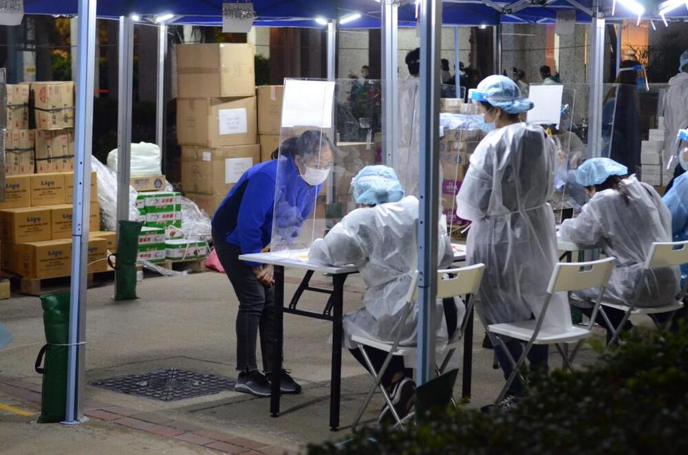 Residents undergo compulsory Covid-19 testing. 