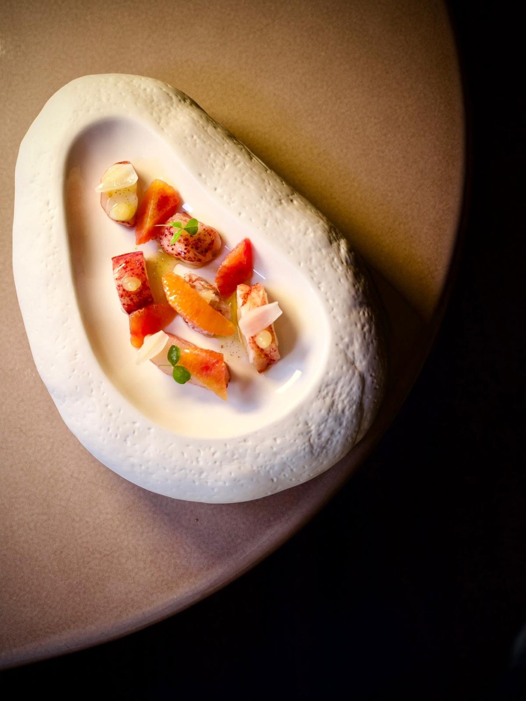 Ami's signature dish Maine lobster, pomelo, vanilla olive oil