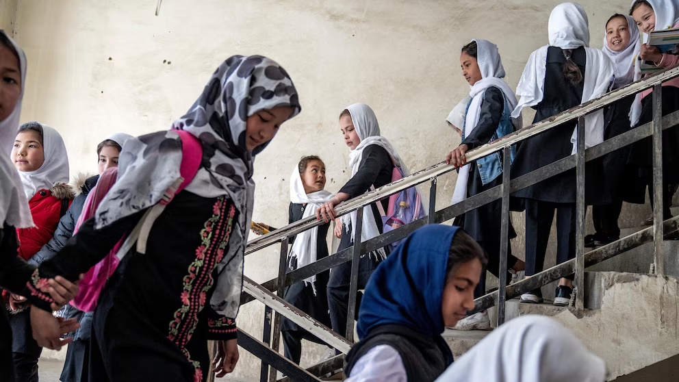 FILE - Girls attend school on the first day of the new school year, in Kabul, Afghanistan, on March 25, 2023. (AP Photo/Ebrahim Noroozi, File) FILE - Girls attend school on the first day of the new school year, in Kabul, Afghanistan, on March 25, 2023. (AP Photo/Ebrahim Noroozi, File)