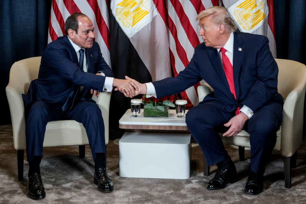 U.S. President Donald Trump shakes hands with Egyptian President Abdel Fattah al-Sisi during a bilateral meeting at the World Economic Forum (WEF) in Davos, Switzerland, January 21, 2026. (Reuters)