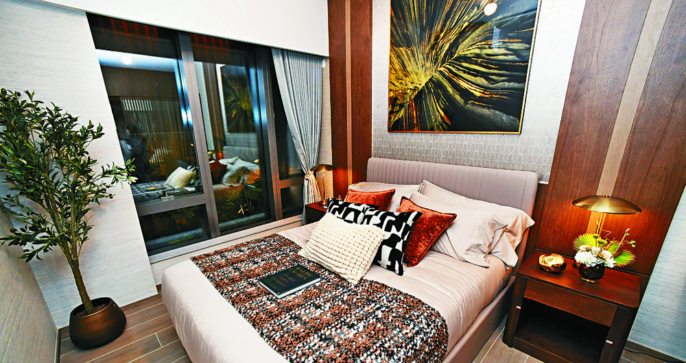SPACIOUS AND BRIGHT: The master bedroom has large windows and a walk-in closet with abundant space for one's clothes.