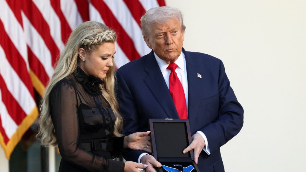 Erika Kirk, wife of Charlie Kirk, receives the Medal of Freedom awarded to Charlie Kirk by President Trump (Reuters)
