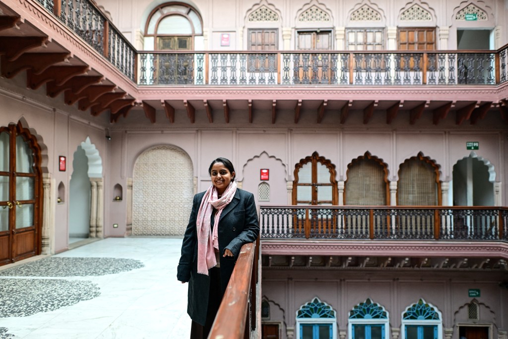 Photo by MANAN VATSYAYANA / AFP  This photograph taken on February 2, 2026 shows Vidyun Goel, whose family owns the Dharampura Haveli, an 18th-century haveli-turned-heritage hotel in the old quarters of Delhi.