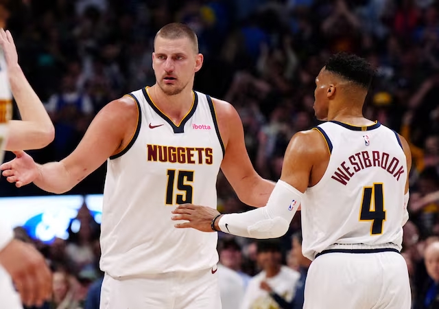 Denver Nuggets center Nikola Jokic (15) and guard Russell Westbrook (4). (Reuters)