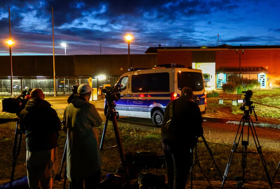 Members of the media wait in front of a prison facility, where Christian Brueckner, a suspect in the case of the disappearance of British toddler Madeleine McCann, is being held ahead of his expected release in Sehnde, Germany, September 17, 2025. REUTERS/Leon Kuegeler