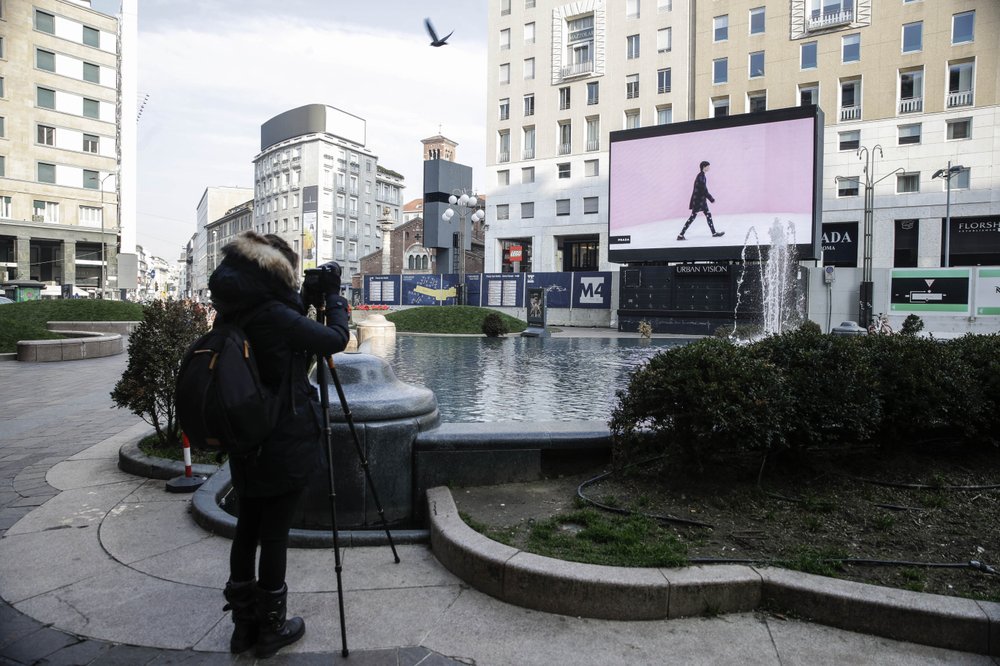A giant screen streams a Prada fashion live show during the Milan's fashion week in Milan, Italy, Sunday, January 17, 2021. A giant screen streams a Prada fashion live show during the Milan's fashion week in Milan, Italy, Sunday, January 17, 2021.