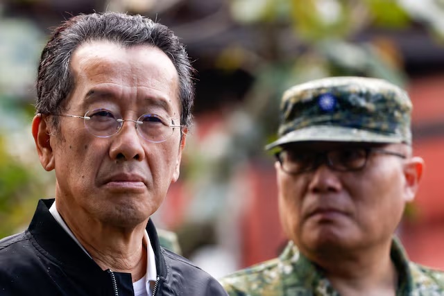 Taiwan Defence Minister Wellington Koo inspects reservists during a training session at Loung Te Industrial Parks Service Center in Yilan, Taiwan December 2, 2025. REUTERS/Ann Wang/File Photo 