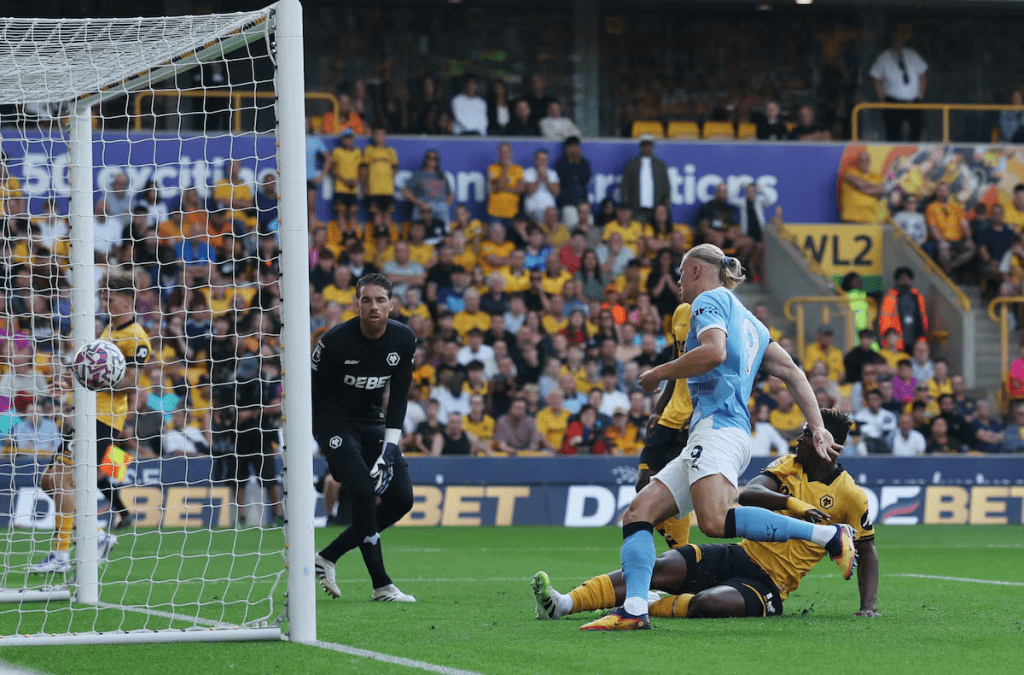 Soccer Football - Premier League - Wolverhampton Wanderers v Manchester City - Molineux Stadium, Wolverhampton, Britain - August 16, 2025 Manchester City's Erling Haaland scores their first goal Action Images via Reuters/Paul Childs