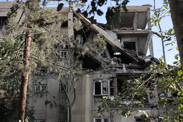 A building stands damaged in the aftermath of Israeli strikes, in Tehran, Iran, June 13, 2025. Majid Asgaripour/WANA (West Asia News Agency) via REUTERS 