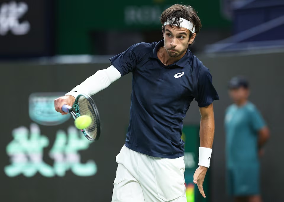 Tennis - ATP Masters 1000 - Shanghai Masters - Qizhong Forest Sports City Arena, Shanghai, China - October 8, 2025 Italy's Lorenzo Musetti in action during his round of 16 match against Canada's Felix Auger Aliassime REUTERS/Go Nakamura